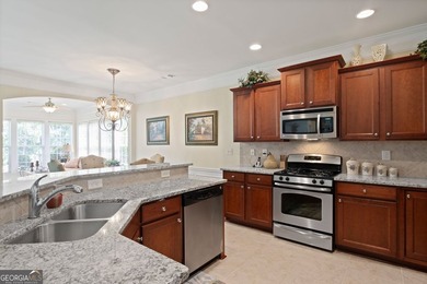 Located on prime golf lot hole #13 in the vibrant Active Adult on Canongate Golf At Sun City Peachtree in Georgia - for sale on GolfHomes.com, golf home, golf lot