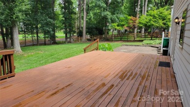 Experience luxury living in one of South Charlotte's most on Raintree Country Club in North Carolina - for sale on GolfHomes.com, golf home, golf lot