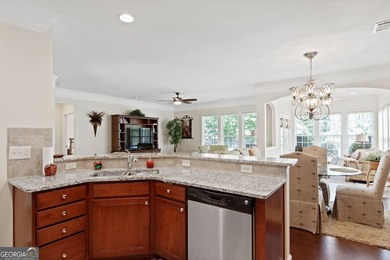 Located on prime golf lot hole #13 in the vibrant Active Adult on Canongate Golf At Sun City Peachtree in Georgia - for sale on GolfHomes.com, golf home, golf lot