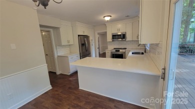 Experience luxury living in one of South Charlotte's most on Raintree Country Club in North Carolina - for sale on GolfHomes.com, golf home, golf lot