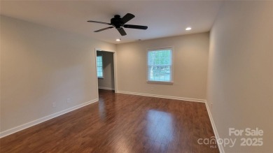 Experience luxury living in one of South Charlotte's most on Raintree Country Club in North Carolina - for sale on GolfHomes.com, golf home, golf lot