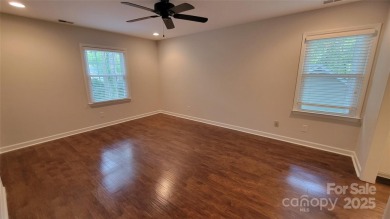 Experience luxury living in one of South Charlotte's most on Raintree Country Club in North Carolina - for sale on GolfHomes.com, golf home, golf lot