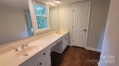 Experience luxury living in one of South Charlotte's most on Raintree Country Club in North Carolina - for sale on GolfHomes.com, golf home, golf lot