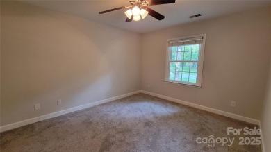 Experience luxury living in one of South Charlotte's most on Raintree Country Club in North Carolina - for sale on GolfHomes.com, golf home, golf lot