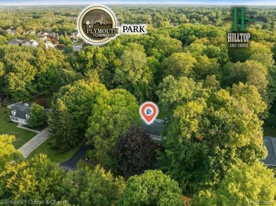 Tucked away on a wooded lot that directly backs up to McClumpha on Hilltop Golf Course in Michigan - for sale on GolfHomes.com, golf home, golf lot