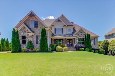 Discover unparalleled luxury at 1776 Traditions Way, an on Traditions of Braselton Golf Club in Georgia - for sale on GolfHomes.com, golf home, golf lot