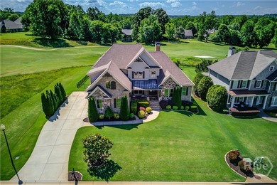 Discover unparalleled luxury at 1776 Traditions Way, an on Traditions of Braselton Golf Club in Georgia - for sale on GolfHomes.com, golf home, golf lot