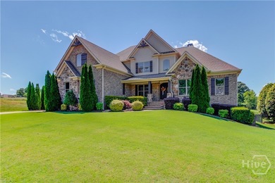 Discover unparalleled luxury at 1776 Traditions Way, an on Traditions of Braselton Golf Club in Georgia - for sale on GolfHomes.com, golf home, golf lot