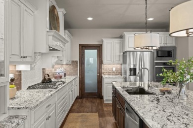 Welcome to 587 W Bayhill Dr-a pristine Craftsman style retreat on Homestead Golf Club and Resort in Utah - for sale on GolfHomes.com, golf home, golf lot