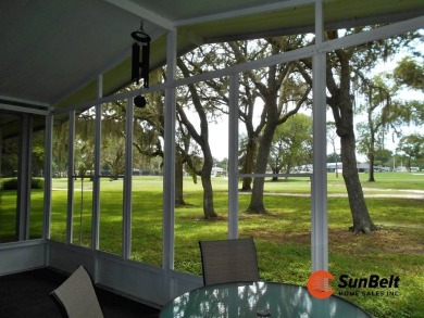 Totally renovated home on the golf course with golf cart on Rolling Greens Executive Golf Community in Florida - for sale on GolfHomes.com, golf home, golf lot