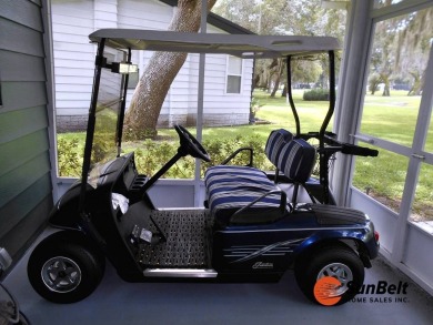 Totally renovated home on the golf course with golf cart on Rolling Greens Executive Golf Community in Florida - for sale on GolfHomes.com, golf home, golf lot