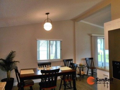 Totally renovated home on the golf course with golf cart on Rolling Greens Executive Golf Community in Florida - for sale on GolfHomes.com, golf home, golf lot