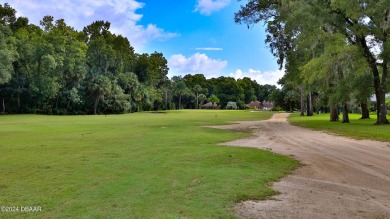 End unit on the Golf Course overlooking the 3rd fairway with on Spruce Creek Golf Club in Florida - for sale on GolfHomes.com, golf home, golf lot