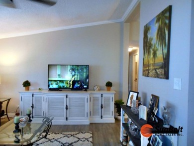Totally renovated home on the golf course with golf cart on Rolling Greens Executive Golf Community in Florida - for sale on GolfHomes.com, golf home, golf lot