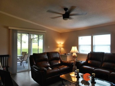 Totally renovated home on the golf course with golf cart on Rolling Greens Executive Golf Community in Florida - for sale on GolfHomes.com, golf home, golf lot