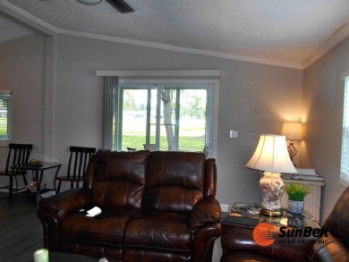 Totally renovated home on the golf course with golf cart on Rolling Greens Executive Golf Community in Florida - for sale on GolfHomes.com, golf home, golf lot