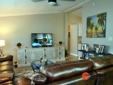 Totally renovated home on the golf course with golf cart on Rolling Greens Executive Golf Community in Florida - for sale on GolfHomes.com, golf home, golf lot