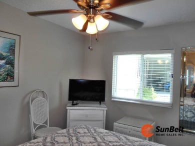 Totally renovated home on the golf course with golf cart on Rolling Greens Executive Golf Community in Florida - for sale on GolfHomes.com, golf home, golf lot