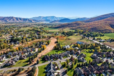 Welcome to 587 W Bayhill Dr-a pristine Craftsman style retreat on Homestead Golf Club and Resort in Utah - for sale on GolfHomes.com, golf home, golf lot