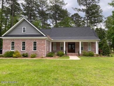 Custom built home on golf course. Beautiful open floor plan with on Cypress Landing Golf Club in North Carolina - for sale on GolfHomes.com, golf home, golf lot