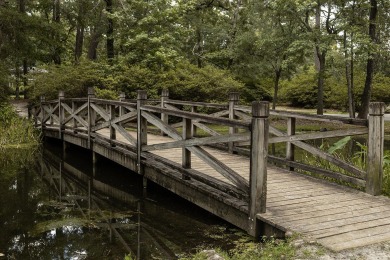 From the moment you arrive, the majestic canopy of ancient live on Miler Country Club in South Carolina - for sale on GolfHomes.com, golf home, golf lot