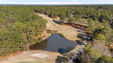 Whispering Pines Charmer with fabulous pond and golf views!! on Whispering Pines Golf Course in North Carolina - for sale on GolfHomes.com, golf home, golf lot