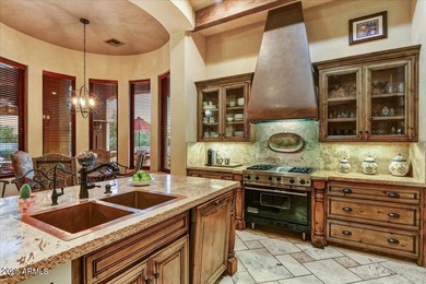 Perched on a hill inside the prestigious Superstition Mountain on Superstition Mountain Club - Lost Gold in Arizona - for sale on GolfHomes.com, golf home, golf lot