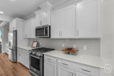 Better than new and beautifully maintained, this 4-bed, 3-bath on Savannah Quarters Country Club in Georgia - for sale on GolfHomes.com, golf home, golf lot