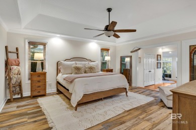 Nestled in the heart of Gulf Shores, this charming two-story on The Golf Club of the Wharf in Alabama - for sale on GolfHomes.com, golf home, golf lot