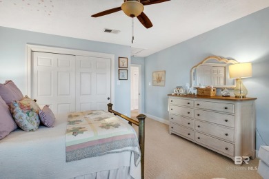 Nestled in the heart of Gulf Shores, this charming two-story on The Golf Club of the Wharf in Alabama - for sale on GolfHomes.com, golf home, golf lot