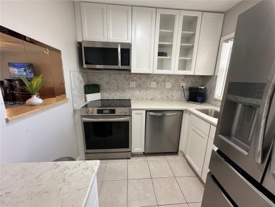 Beautiful one bedroom one bathroom condo in active 55+ community on Sunrise Lakes Phase III in Florida - for sale on GolfHomes.com, golf home, golf lot