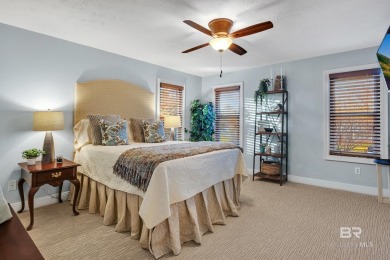 Nestled in the heart of Gulf Shores, this charming two-story on The Golf Club of the Wharf in Alabama - for sale on GolfHomes.com, golf home, golf lot