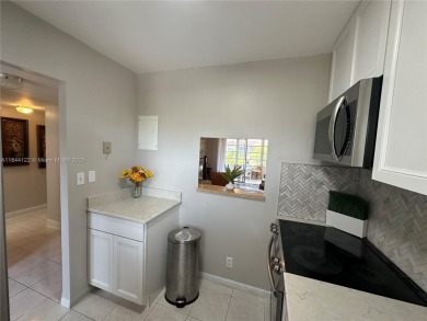 Beautiful one bedroom one bathroom condo in active 55+ community on Sunrise Lakes Phase III in Florida - for sale on GolfHomes.com, golf home, golf lot