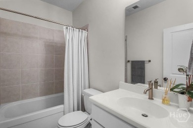 Better than new and beautifully maintained, this 4-bed, 3-bath on Savannah Quarters Country Club in Georgia - for sale on GolfHomes.com, golf home, golf lot