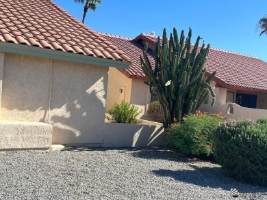 Golf Course Living, Easy Care landscaping, beautiful sunset on Mesa Del Sol Golf Club in Arizona - for sale on GolfHomes.com, golf home, golf lot