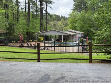 Beautiful lot ready for a new construction home. Sewer, water on Carolina Trace Country Club in North Carolina - for sale on GolfHomes.com, golf home, golf lot