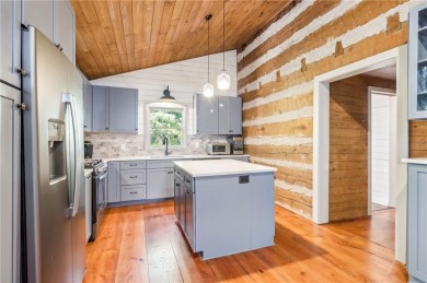 Oh my goodness! This home is an actual cabin and is amazing on Big Canoe Golf Club - Cherokee in Georgia - for sale on GolfHomes.com, golf home, golf lot