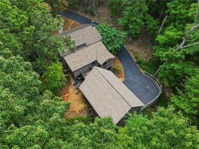 Oh my goodness! This home is an actual cabin and is amazing on Big Canoe Golf Club - Cherokee in Georgia - for sale on GolfHomes.com, golf home, golf lot