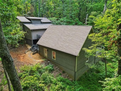 Oh my goodness! This home is an actual cabin and is amazing on Big Canoe Golf Club - Cherokee in Georgia - for sale on GolfHomes.com, golf home, golf lot