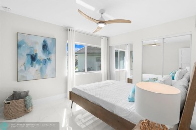 Discover this beautifully updated South Florida home in sunny on Boca Greens Country Club in Florida - for sale on GolfHomes.com, golf home, golf lot