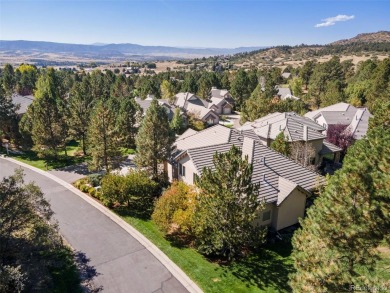 Discover luxury, convenience, and serenity in this stunning home on Country Club at Castle Pines in Colorado - for sale on GolfHomes.com, golf home, golf lot