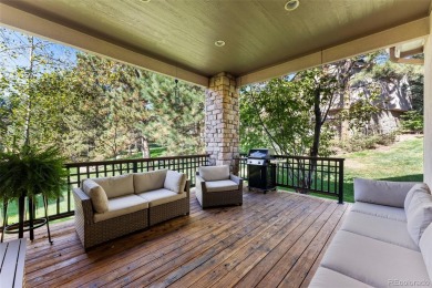 Discover luxury, convenience, and serenity in this stunning home on Country Club at Castle Pines in Colorado - for sale on GolfHomes.com, golf home, golf lot