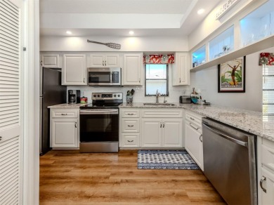 Move-in-ready, 2nd floor end unit with Private Entrance on Capri Isle Golf Club in Florida - for sale on GolfHomes.com, golf home, golf lot
