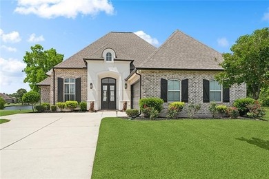 Well-Built Custom Home with Water Access and Golf Course Viewse on Oak Harbor Golf Club in Louisiana - for sale on GolfHomes.com, golf home, golf lot