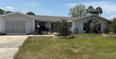 Huge 5 bedroom, 3 bath home located just outside Crystal River on Plantation Inn and Golf Resort  in Florida - for sale on GolfHomes.com, golf home, golf lot
