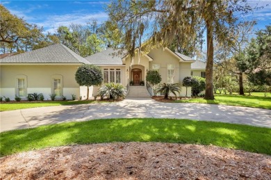 MUST SEE this beautiful Southern-style home with a circular on The King and Prince Golf Course, Home of the Hampton Club in Georgia - for sale on GolfHomes.com, golf home, golf lot