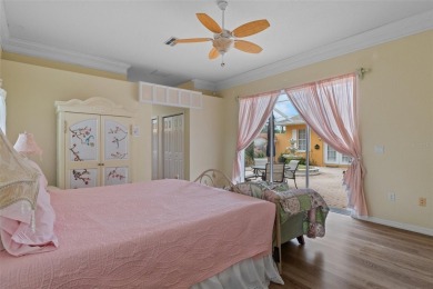 Stunning Custom-Built Palmwood Courtyard Home Nestled In The on Silverthorn Country Club in Florida - for sale on GolfHomes.com, golf home, golf lot