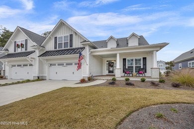 Discover low-maintenance living in this Collington Towns duplex on Cape Fear National At Brunswick Forest in North Carolina - for sale on GolfHomes.com, golf home, golf lot