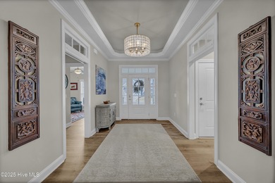 Discover low-maintenance living in this Collington Towns duplex on Cape Fear National At Brunswick Forest in North Carolina - for sale on GolfHomes.com, golf home, golf lot