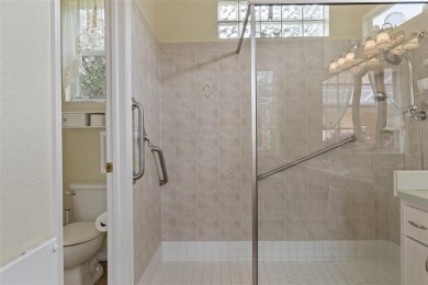 Stunning Custom-Built Palmwood Courtyard Home Nestled In The on Silverthorn Country Club in Florida - for sale on GolfHomes.com, golf home, golf lot